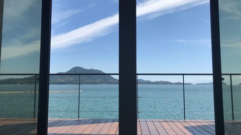 Enjoy the spectacular view of Setouchi from the oceanfront terrace and rooms
