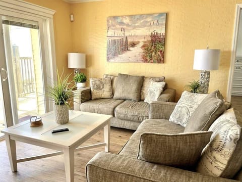 Bright and beachy with comfy seating for the whole crew.