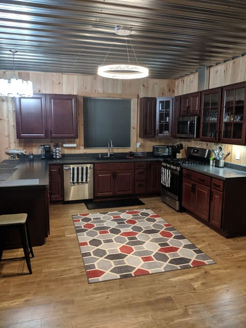 Large kitchen with plenty appliances to make stay comfortable. 