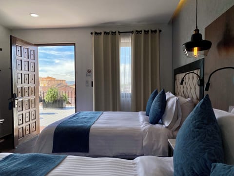 Deluxe Double Room | In-room safe, desk, laptop workspace, blackout drapes