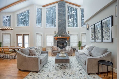Living room looking into the pine and larch forest. Hence, The Woods name. 