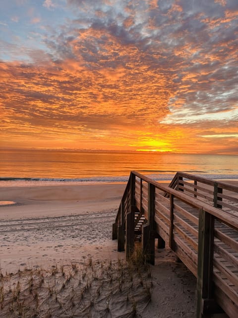 Morning sunrise from complex beach access.