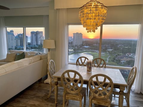 Stunning sunset views of the Gulf and Baytowne hole 14 from living/dining room.