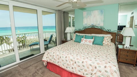 Master bedroom has sliding glass doors leading to the main balcony
