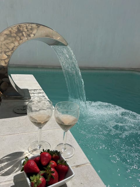Seasonal outdoor pool, open 11:00 AM to 8:00 PM, sun loungers