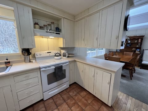 Kitchen leading into dining/living area