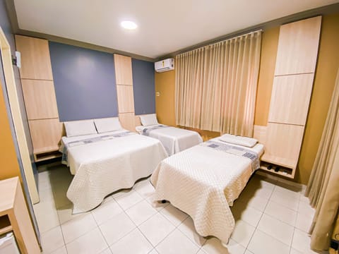 Basic Triple Room | Desk, laptop workspace, free WiFi, bed sheets