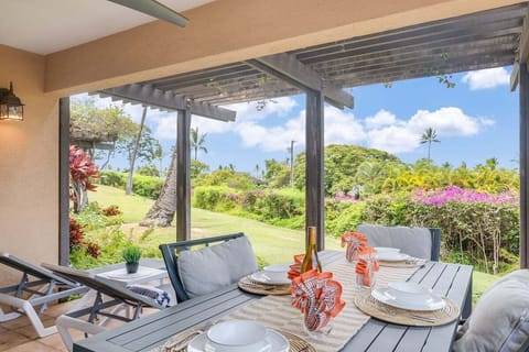 Dine outdoors on patios framed by palms and sky.