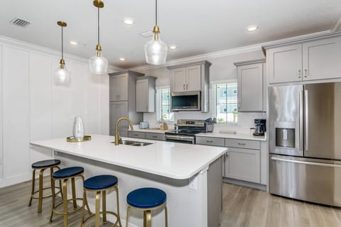 Modern kitchen supplied with what you'll need to cook up family meals