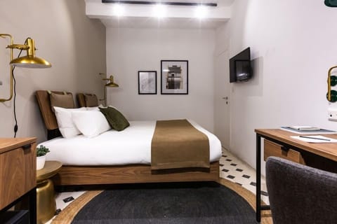 Desk, laptop workspace, blackout drapes, iron/ironing board