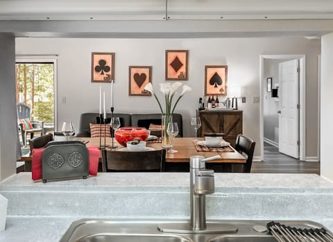 The chef of the group won't be isolated thanks to the cut out kitchen wall. You can see the primary bedroom entry on the right.