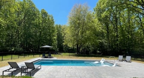 Large heated pool with sun shelf!  Plenty of room for relaxing in the sun.