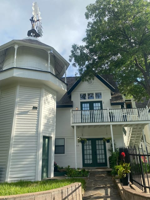 The apt is through the downstairs French doors.