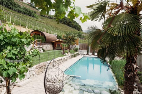Seasonal outdoor pool, open 7:00 AM to 8:00 PM, pool umbrellas