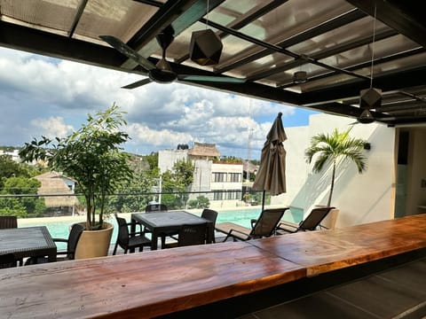Family Studio Suite | Rooftop pool | Outdoor pool, open 8:30 AM to 11:00 PM, sun loungers