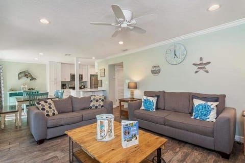 Roomy living room with a pull out couch.
