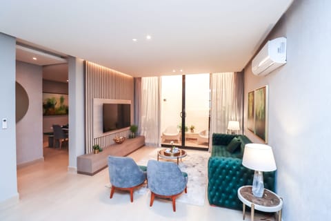 Apartment, 3 Bedrooms | Living area | 32-inch LCD TV with cable channels, TV