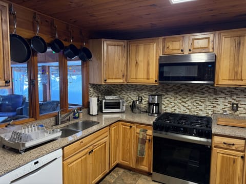 Kitchen is equipped with all the essential to make your favorite meals.