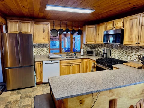 There is plenty of counter space for a family meal preparation.