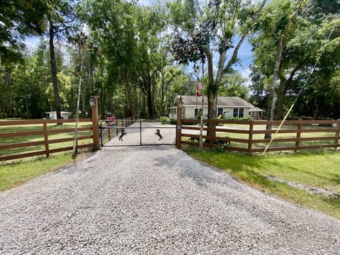 Private, gated guest entrance with motorized gate. 