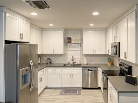 Cook in the modern and fully stocked Kitchen!