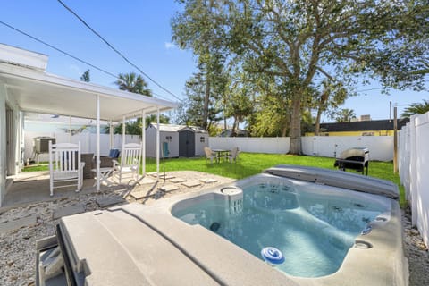 Salty Air's backyard space with hot tub