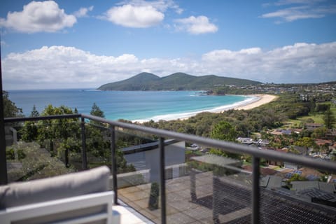 Wow! Relax with a drink and nibbles here and take in the view from the balcony.