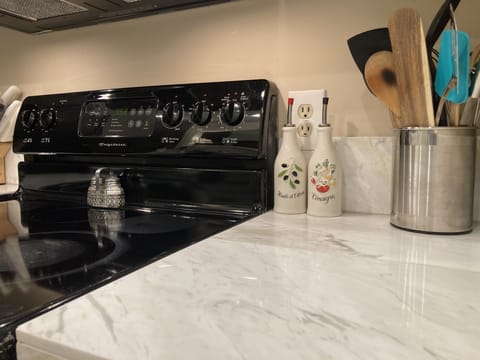 Kitchen includes basic oil / spices, blender, coffee, microwave, & toaster oven.
