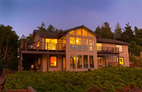 This incredible 5000-square-foot lake house features loads of outdoor spaces.