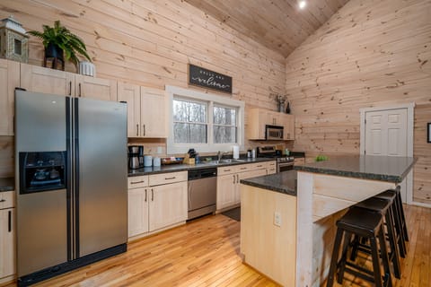 Kitchen includes bar seating for four.