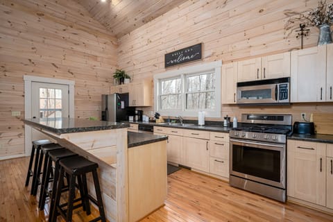 Fully stocked kitchen, includes dishes, silverware, cups, pots, pans and more!