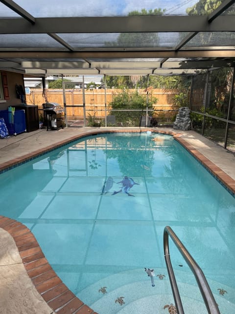 Tropical Heated Pool and Screened in Lanai