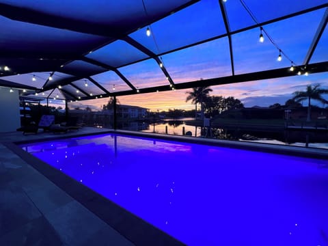 Welcome to "Reflections" – BRAND NEW, HEATED POOL with views of the canal!