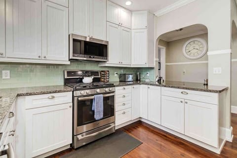 This fully stocked, full-size kitchen features a gas stove and oven, a microwave, and everything you need to prepare a meal. With ample counter space and modern appliances, it’s perfect for cooking and entertaining.