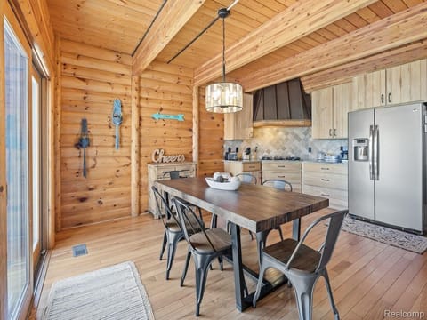 6-seat kitchen table. Move table to dining room for big gatherings. 