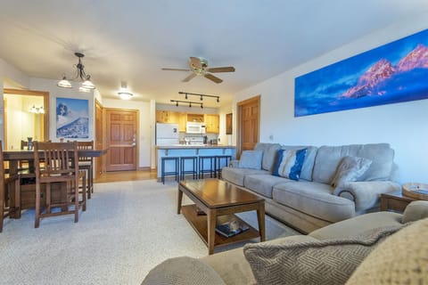 Living, Dining and Kitchen featuring magnificent photography and cozy furniture