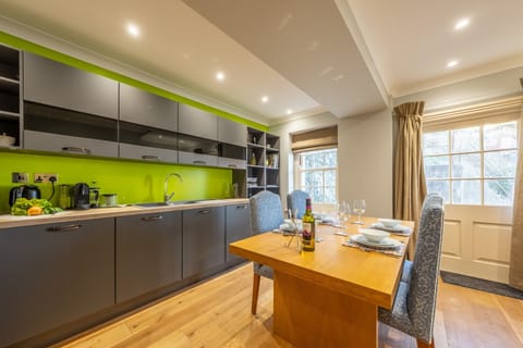 Ground floor: A door to the side of the kitchen offers further sea views