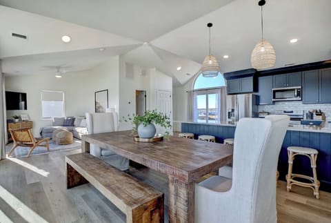 Open-concept living/kitchen/dining makes gathering inside so comfortable.