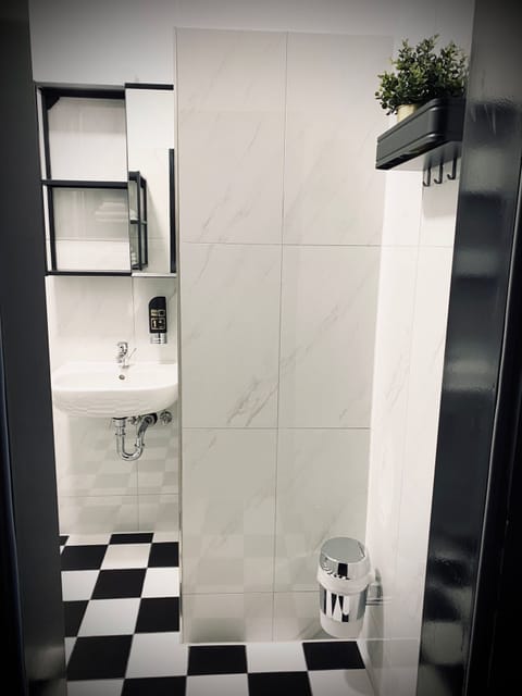 Casino four-bed room with neighborhood view and balcony | Bathroom | Shower, towels