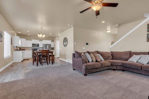 Living room shot with a view of the dining room/kitchen area.