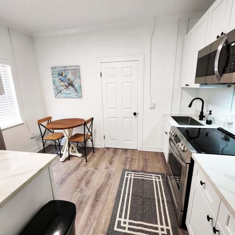 Kitchen &amp; dining area in second room