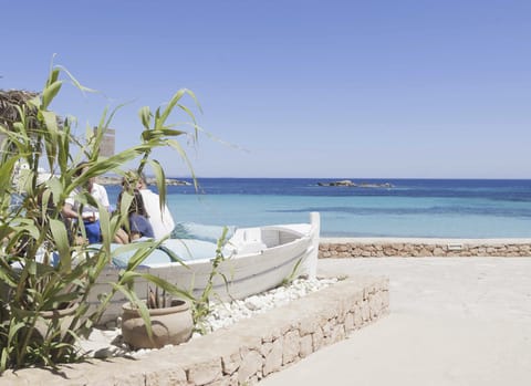 Beach nearby, white sand, sun loungers, beach umbrellas