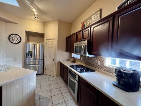 Gas burners on stove and plenty of pantry and cabinet space