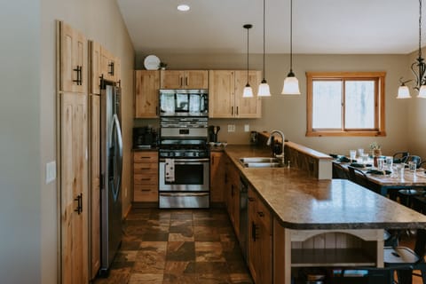 The fully equipped, newly renovated kitchen features sharp knives, an instapot, toaster, dishwasher, full coffee bar, pots, pans, and everything you need for quick meals.