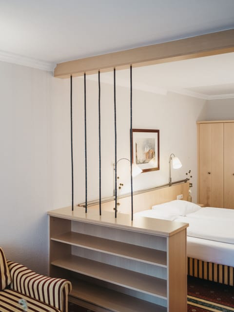 Family Room | Hypo-allergenic bedding, minibar, in-room safe, desk