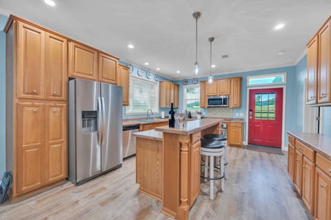 Bright, spacious and well equipped kitchen with additional prep sink.