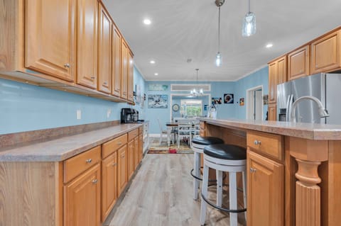 In addition to our 8 person table, there are 2 extra spots at the counter. 