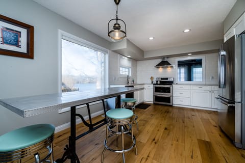 Kitchen table seats 7 (all stools not pictured)