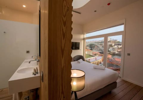 Suite, Private Bathroom, River View | Soundproofing, free WiFi, bed sheets