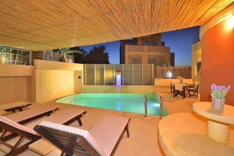 Villa | Bathroom | Shower, rainfall showerhead, hair dryer, towels